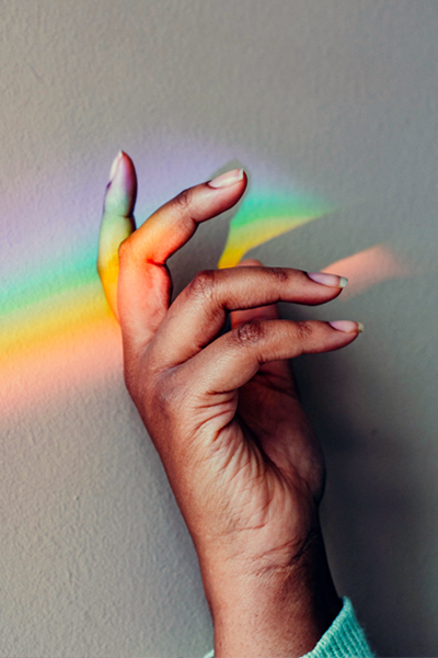 Discover true freedom with a soul retrieval, remote distance energy healing, power animal retrieval or guided journey with Shamanic Healer and Psychic Healing Medium, Tanya Morgan. This photo of a woman's hand trying to catch rainbow rays is by Noelle Rebekah on Unsplash.